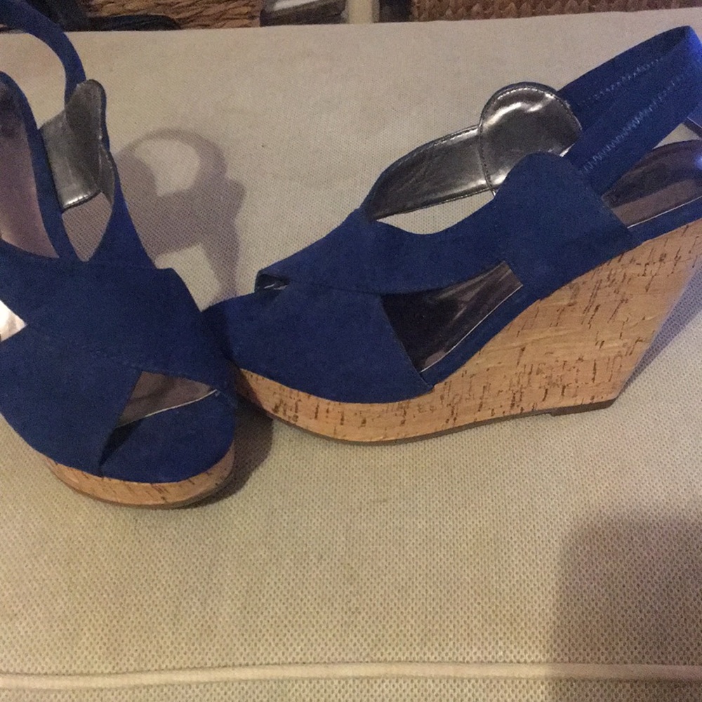 Carlos Santana wedge sandal.